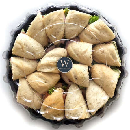 Assorted sandwich platter tray with fresh, customizable options, on housemade breads from Whippt Kitchen. Ideal for office catering or corporate events.